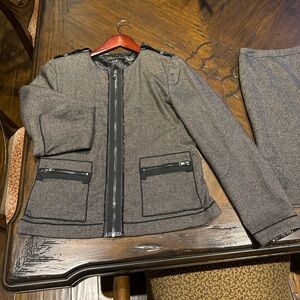 Ellie Tahari Woman’s Suit size 8.  Matching blazer and skirt.  Fully Lined